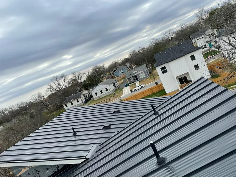 Standing seam metal roof panels with vents for Skylight Repair in East Peoria